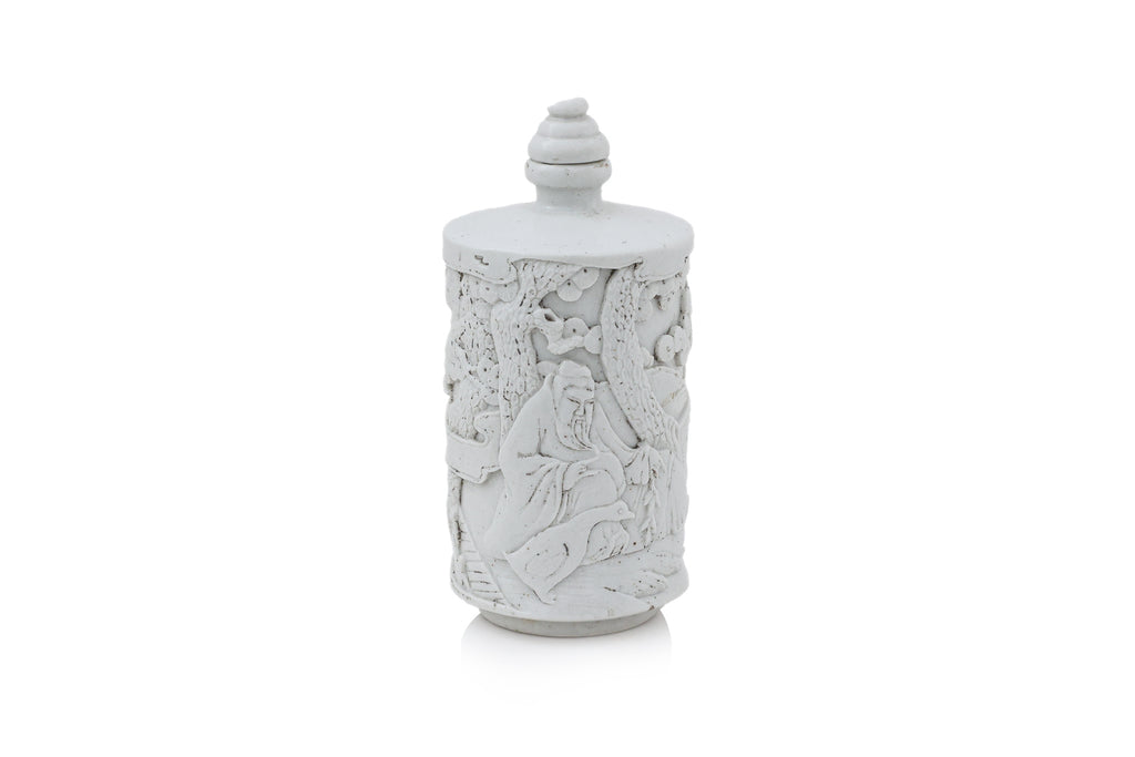 A SMALL WHITE GLAZED PORCELAIN BOTTLE