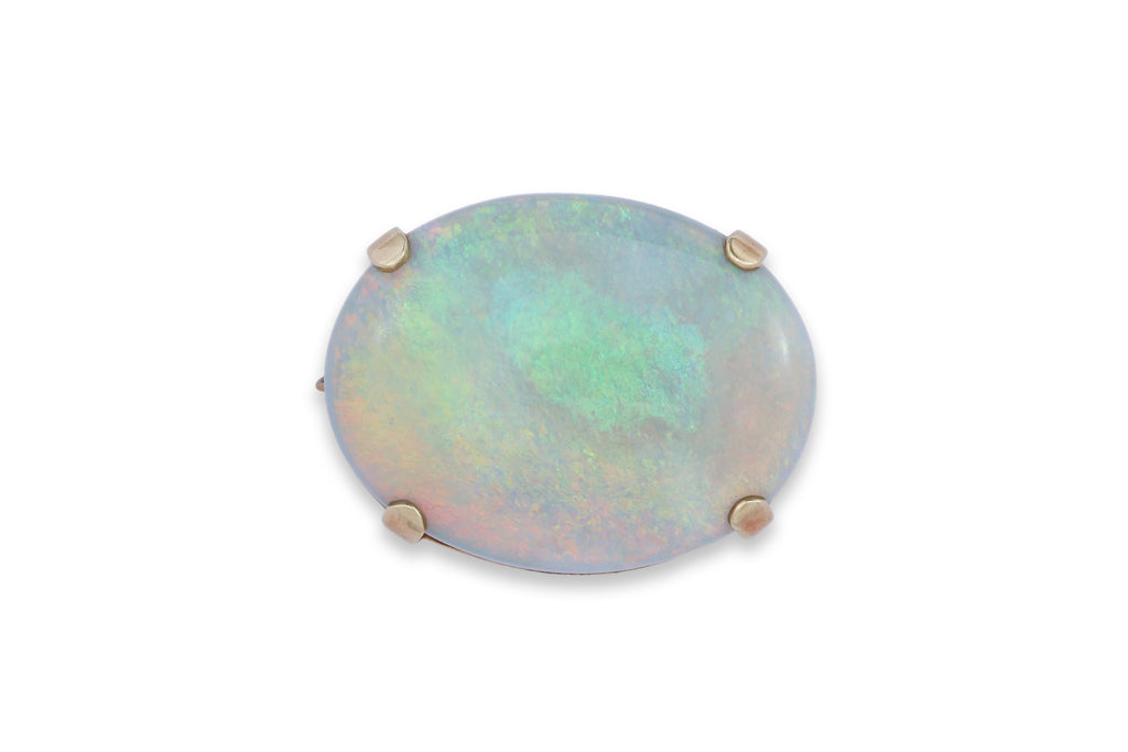 A LARGE OPAL PENDANT/BROOCH ON A CHAIN