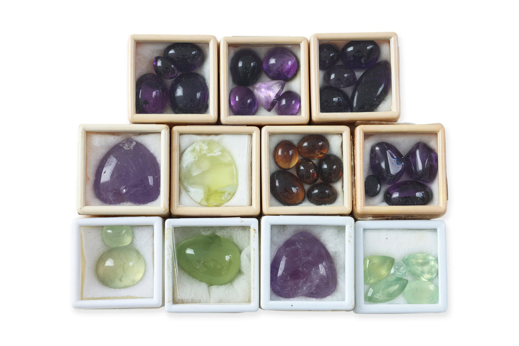 A GROUP OF UNMOUNTED GEMSTONES (34)