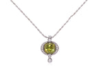 A SPHENE AND DIAMOND PENDANT ON CHAIN