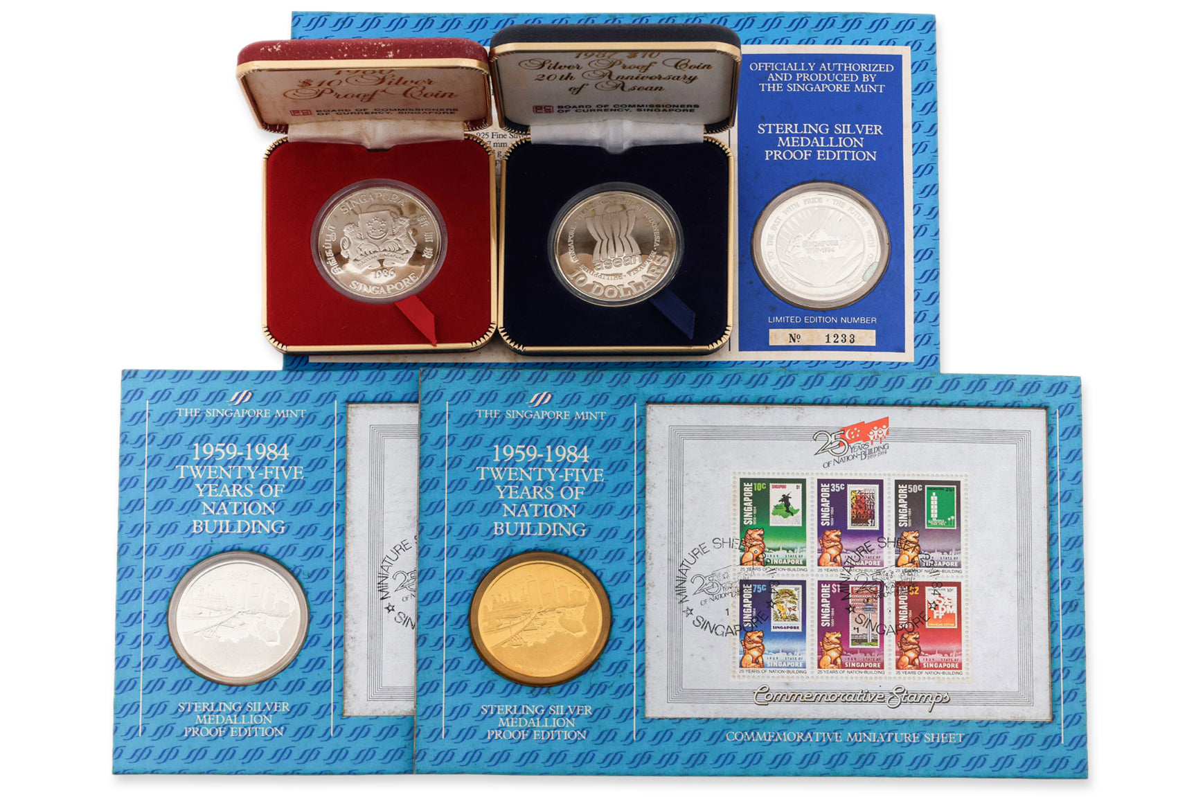 A GROUP OF SINGAPORE SILVER COINS