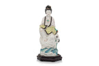 A POLYCHROME-ENAMELLED PORCELAIN FIGURE OF A WOMAN AND BIRD
