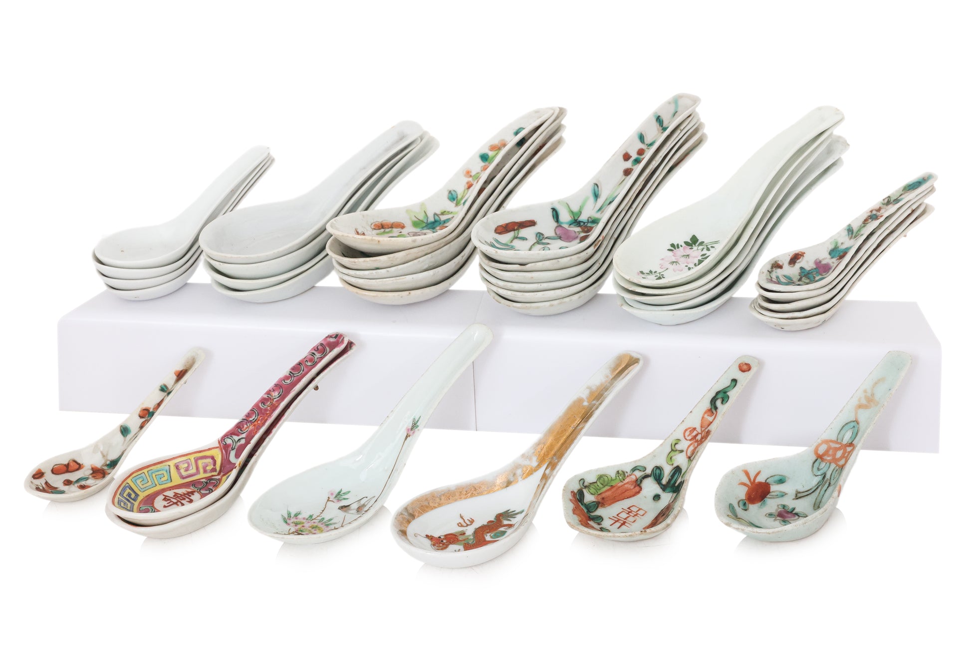 A GROUP OF 36 ASSORTED PORCELAIN SPOONS