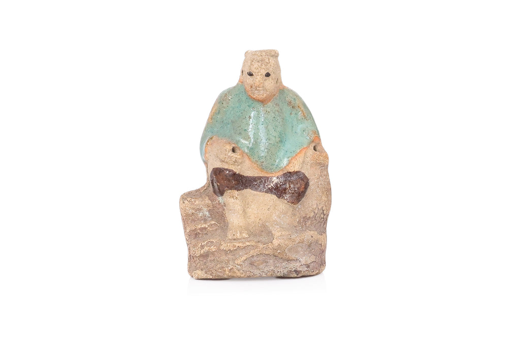 A GROUP OF SIX COVERS AND A SMALL STATUE