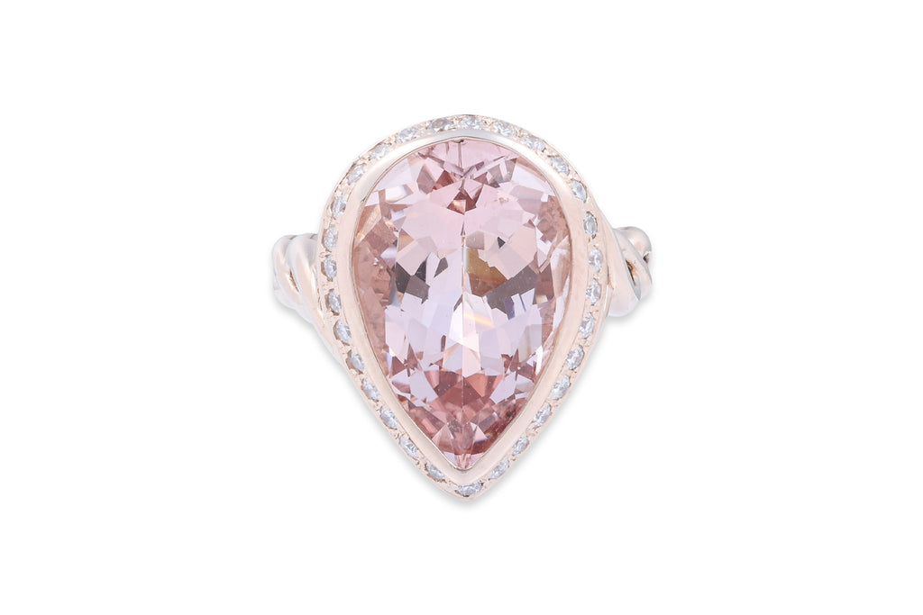 A MORGANITE AND DIAMOND RING