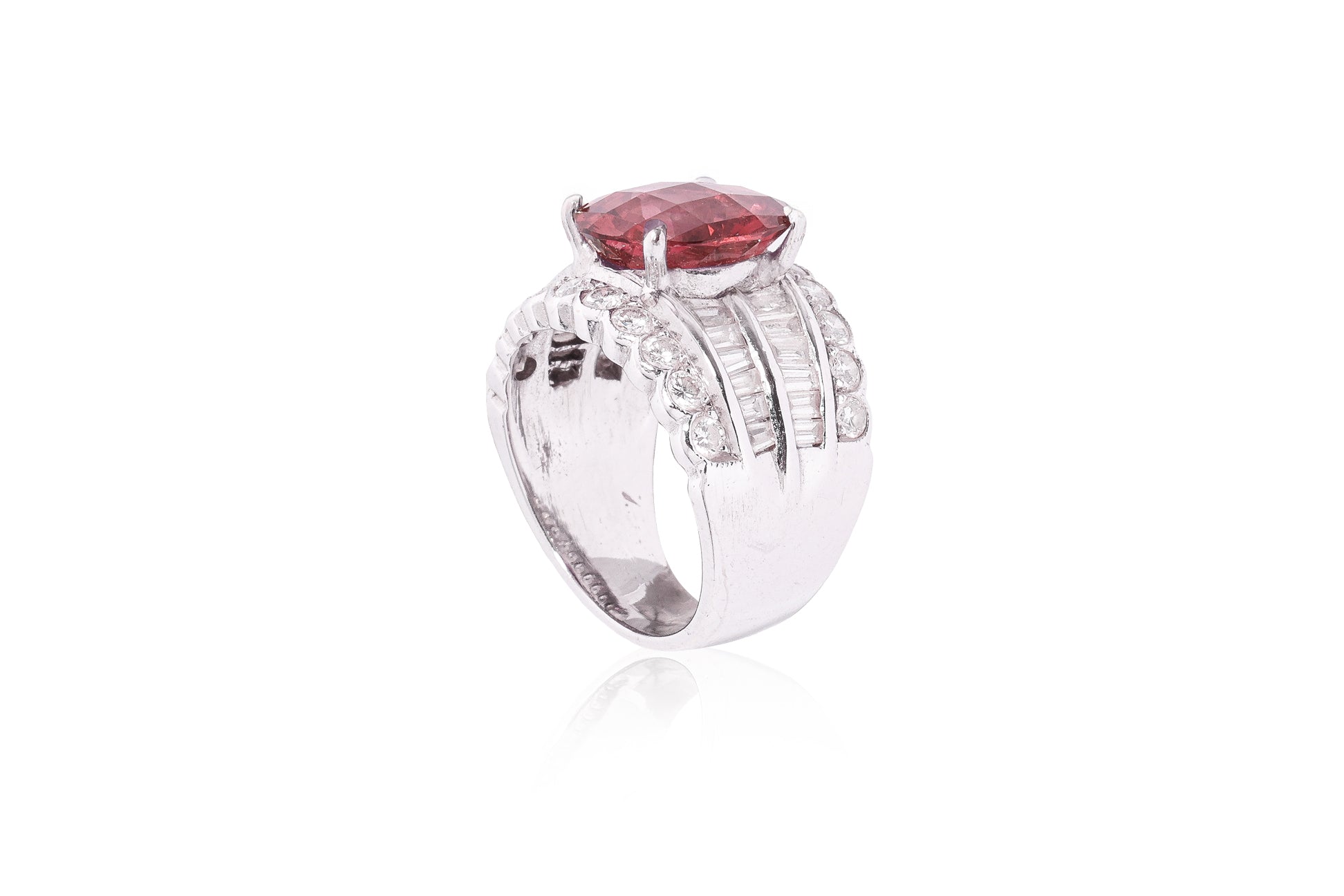 A PINK TOURMALINE AND DIAMOND RING