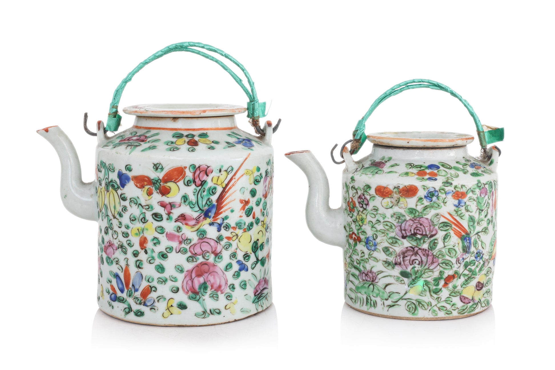 A GROUP OF FOUR FAMILLE ROSE PORCELAIN TEAPOTS