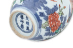 A MINIATURE WUCAI VASE AND A BLUE AND WHITE LOTUS DISH