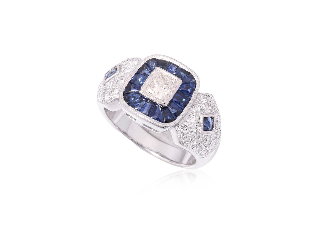 A DIAMOND AND SAPPHIRE RING