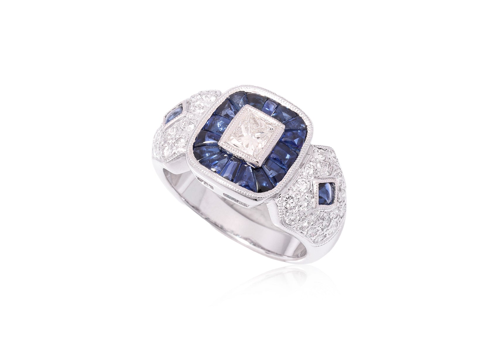 A DIAMOND AND SAPPHIRE RING