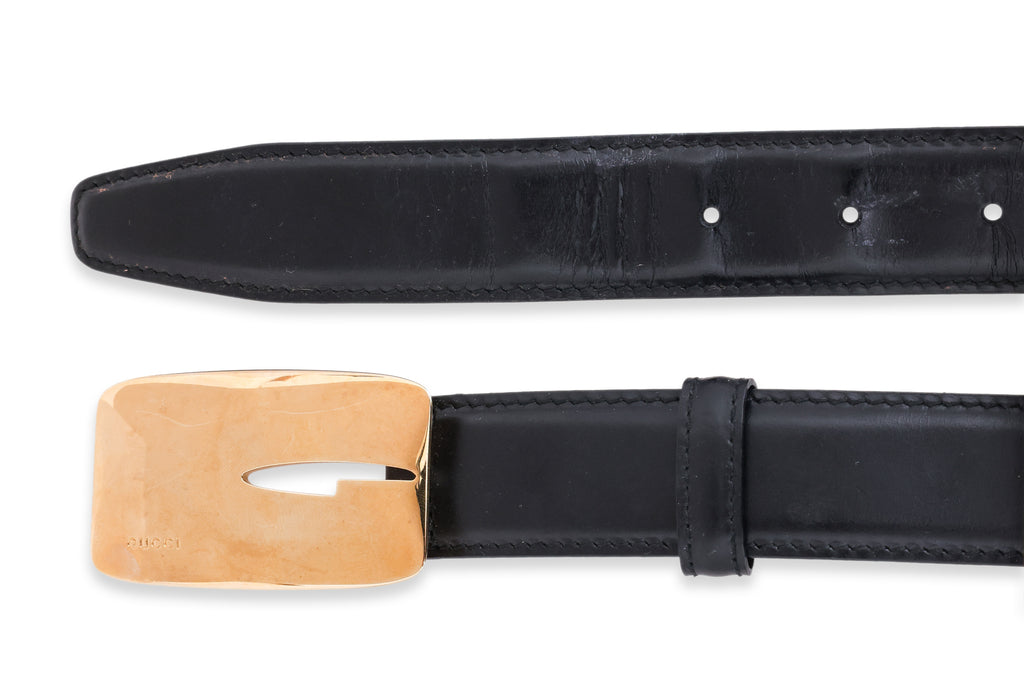 GUCCI - A GOLD TONE 'G' LOGO BELT