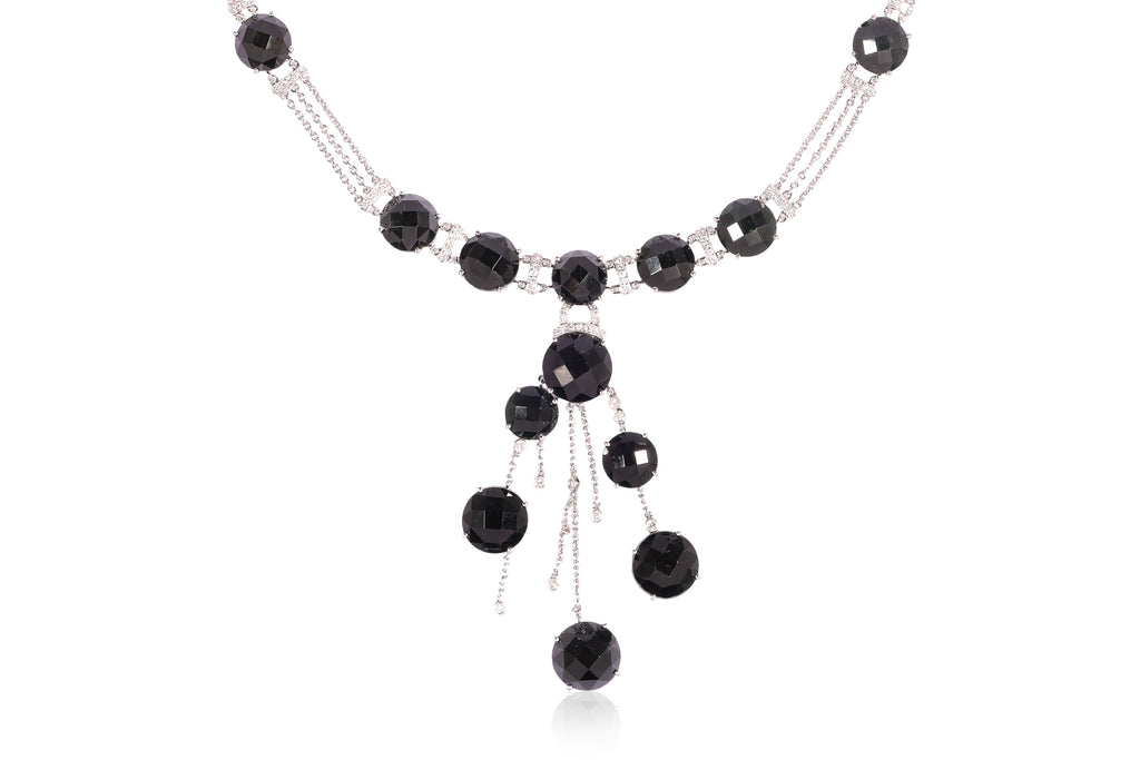 A BLACK JADE AND DIAMOND NECKLACE