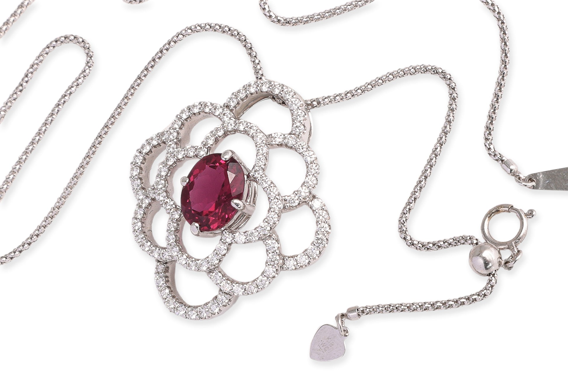 A TOURMALINE AND DIAMOND PENDANT BY JEUNET, WITH A CHAIN